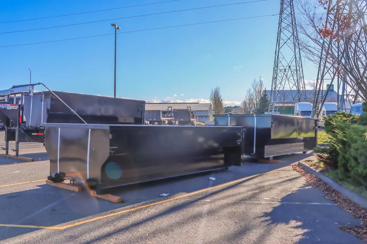 Roll-off dumpster ready for waste disposal at job site for 3 Yard Dumpster Rental in Old Orchard Beach
